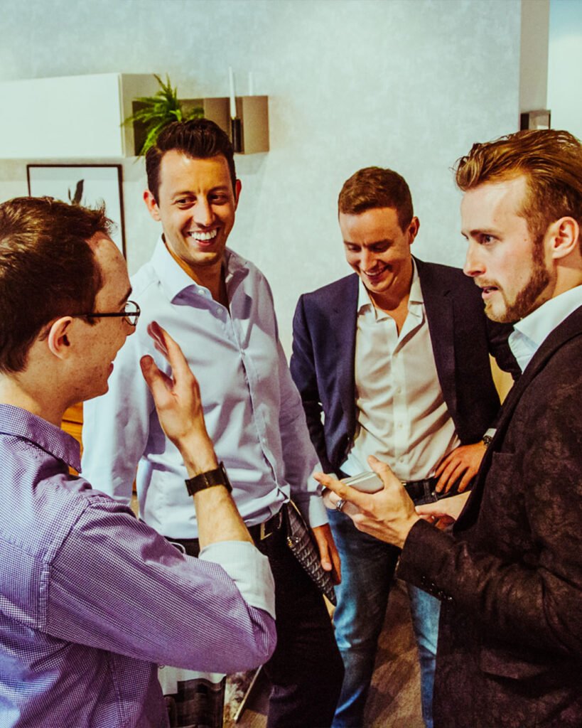 corporate-gallery-tall-03 Clients enjoying Chris Dodd’s magic at a London post work drinks event