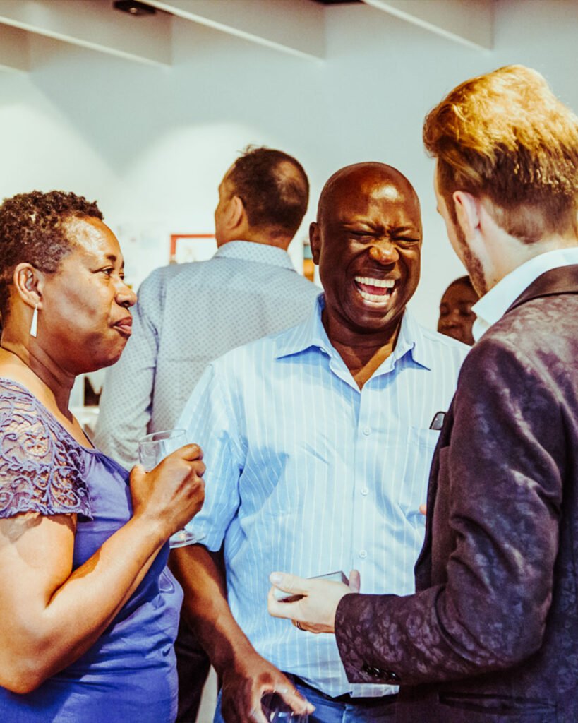 corporate-gallery-tall-04 Corporate clients laughing and amazed during Chris Dodd’s mind reading routine at a London event