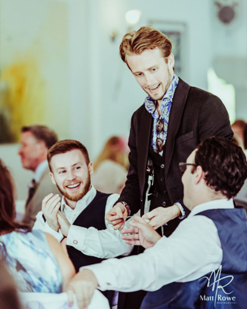 wedding-gallery-tall-03 Wedding magician making laughter at the wedding breakfast.
