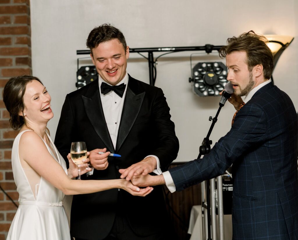 6A8DA5CF-F609-4F9E-8BB7-ABFF05D95C62 Mini show at top table. Bride and groom in photo.