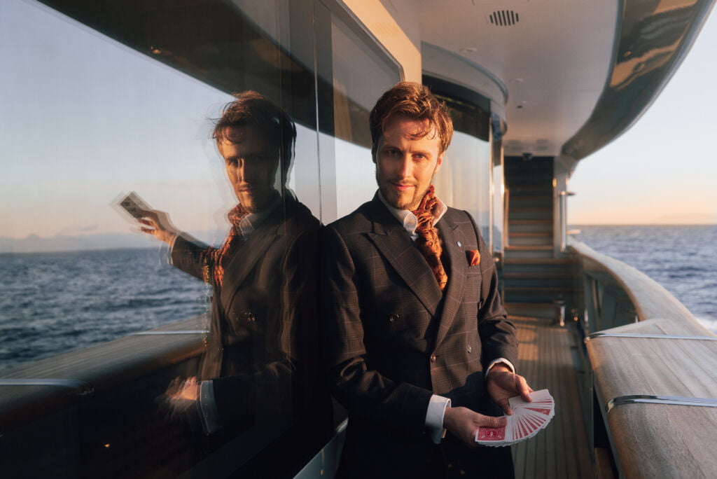 HH_08197-Edit-2 Chris Dodd Magic, superyachts magician...on deck. Yacht entertainment for yacht charters.