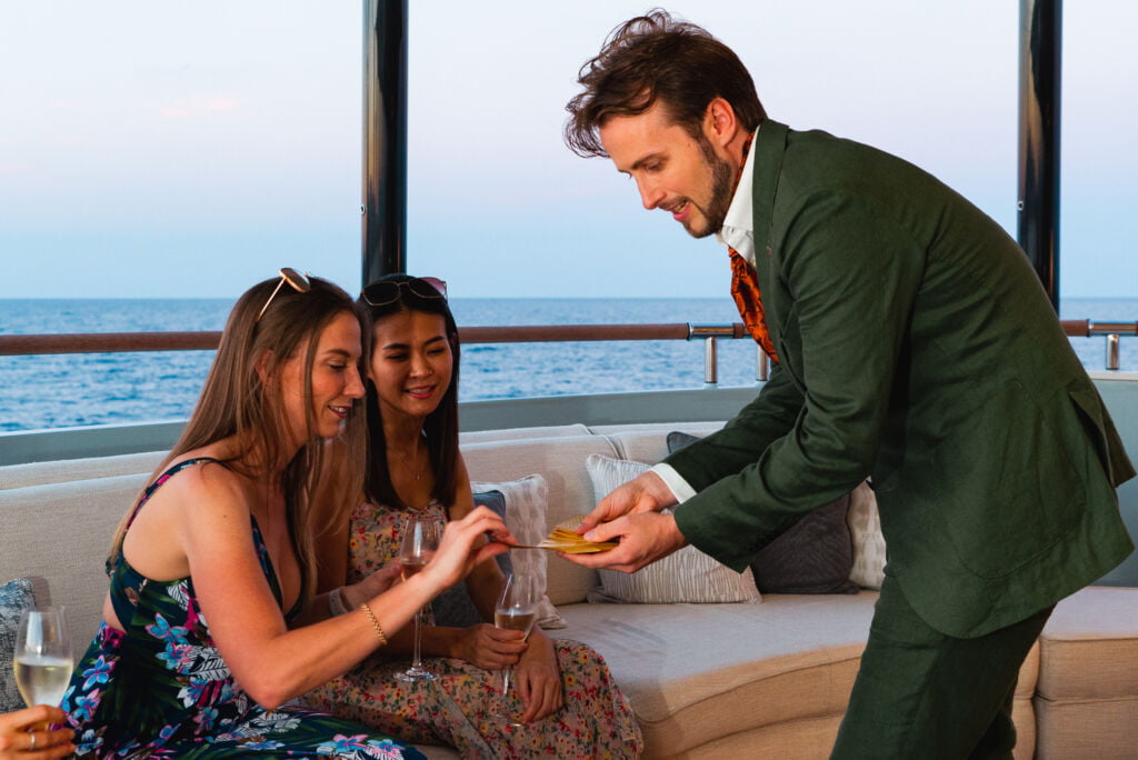 HH_08412 Chris Dodd Magic entertaining on board superyachts. Yacht entertainment for yacht charters.