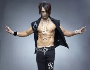 Famous magicians - Modern magician Criss Angel mid-illusion during a dramatic stage performance.