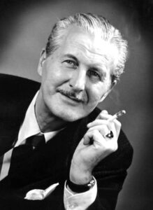 Famous magicians - Vintage photo of Dai Vernon, the famous magician known as The Professor, performing close-up card magic.