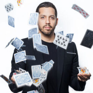 Famous magicians - David Blaine in a public stunt, showcasing his endurance-based street magic style.
